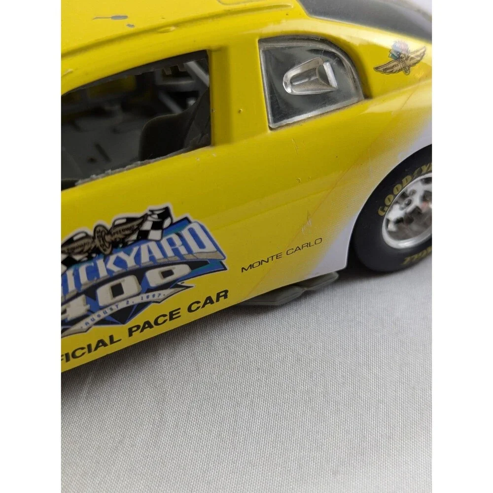 1996 Racing Champions Chevrolet BriCkyard 400 1:64 Monte Carlo Car Yellow